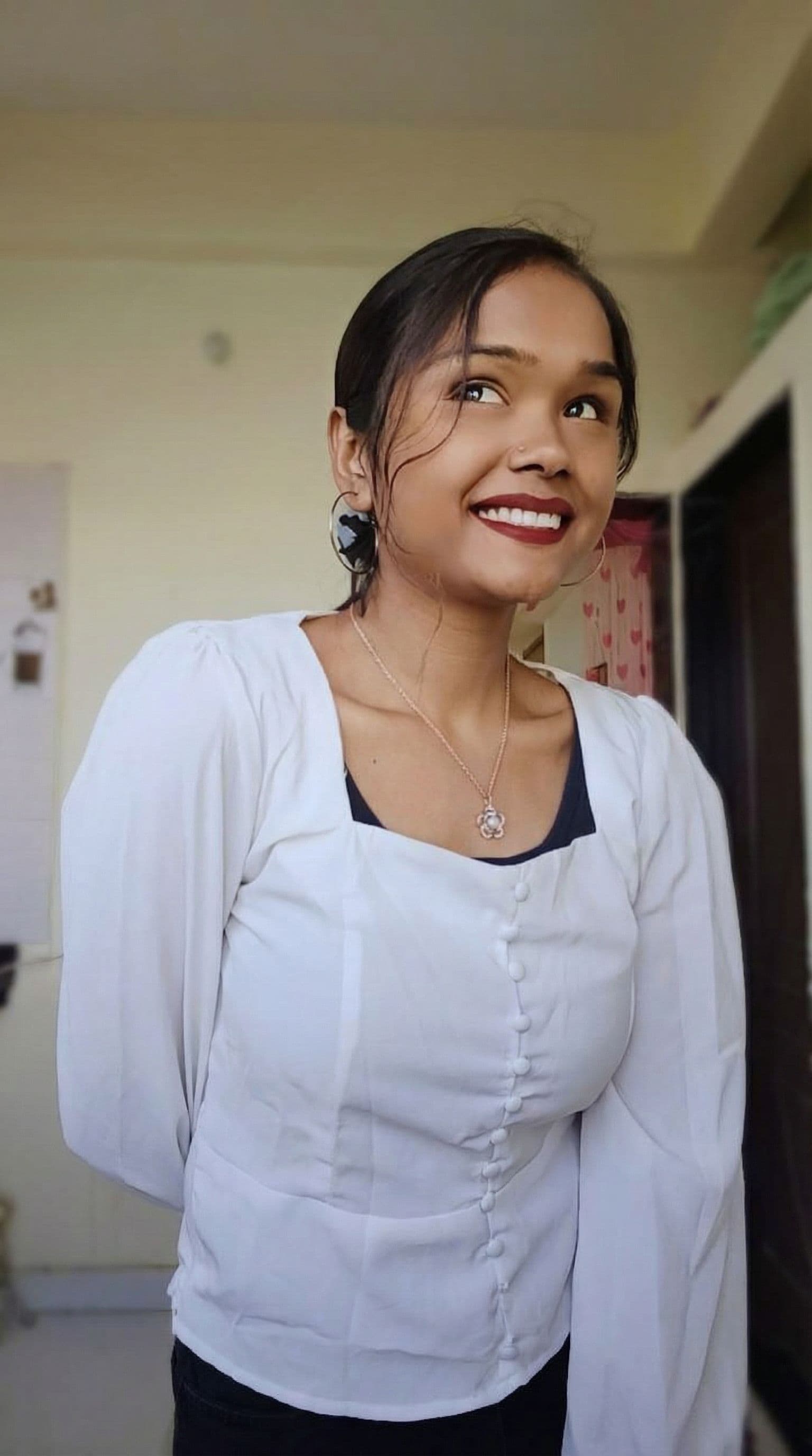 AI generated: capturing a shallow depth of field to focus on her face and upper body while softly blurring the bac...