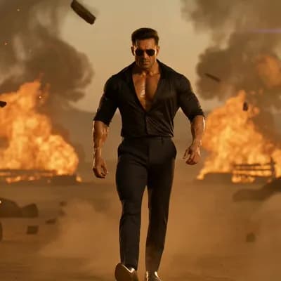 AI generated video: A high-octane South Indian mass action movie scene. A fierce and muscular male action hero in a styl...