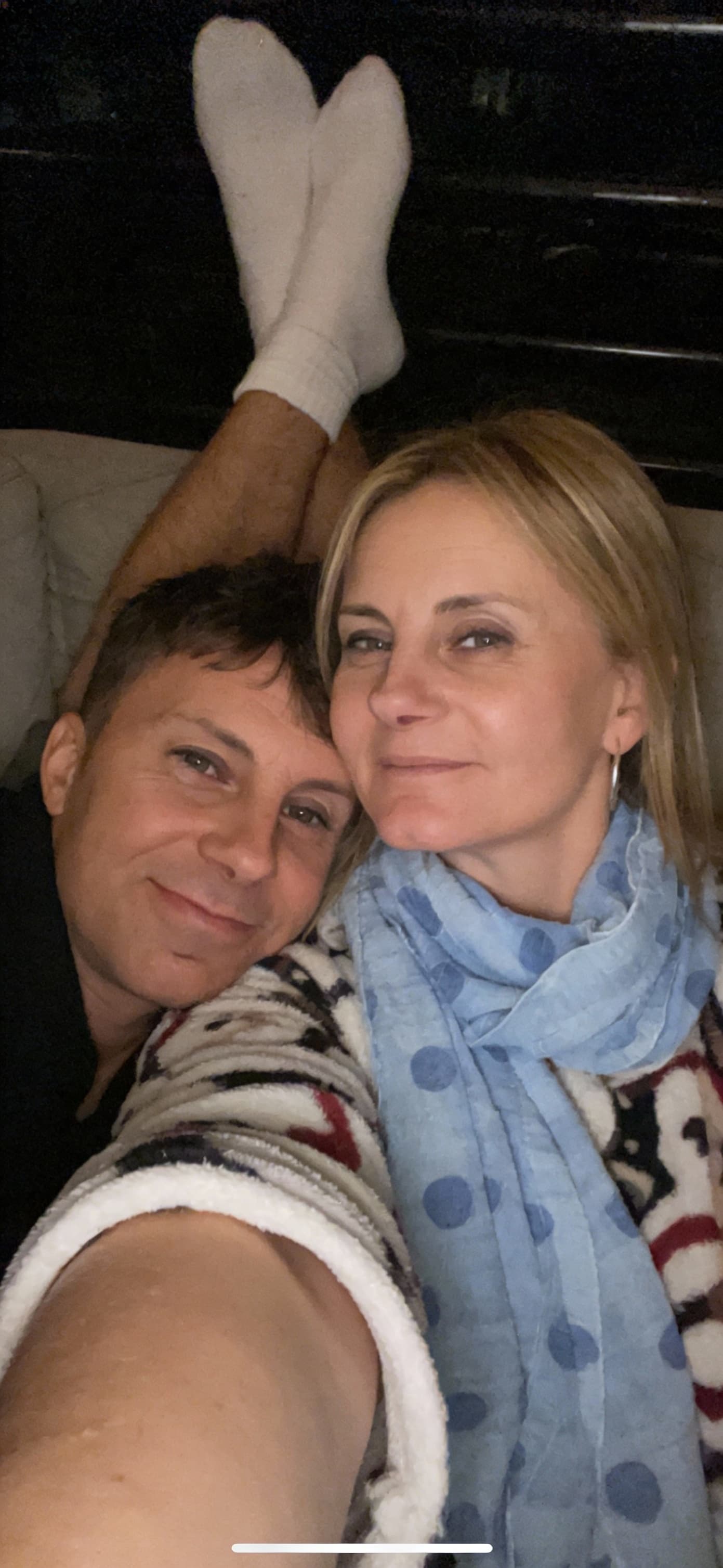 AI generated: Romantic iPhone selfie point of view looking at me,a sloppy snapshot. on a couch at night teasing(no...