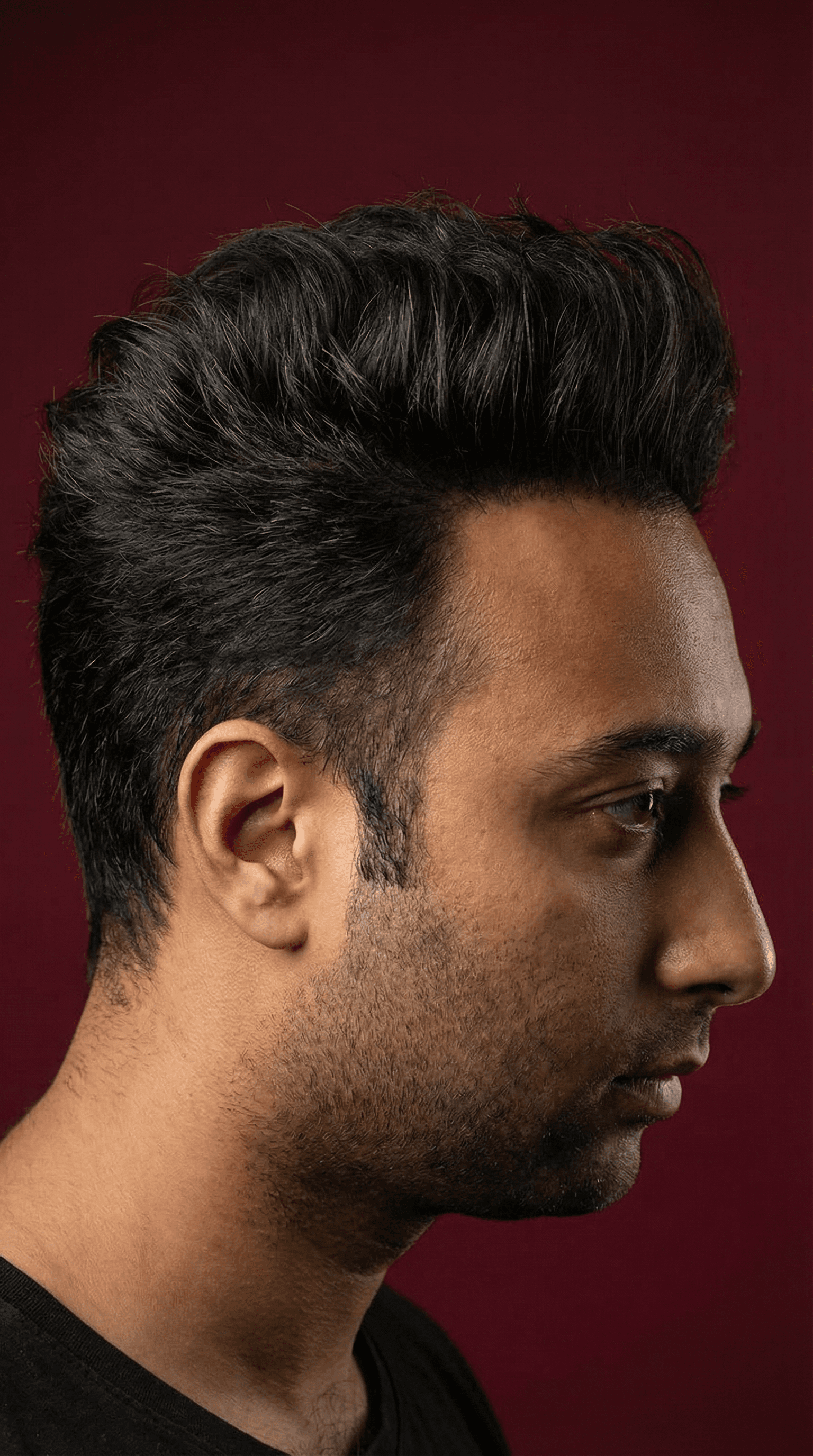 AI generated: hair photography, side view of a man, slicked-back undercut hair style, rich mahogany hair color, hi...