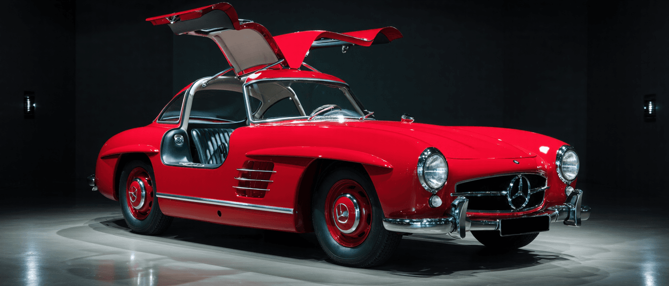 AI generated: Create a realistic photo of a Mercedes Benz SL Gullwing from 1962 in firework red (DB 534) combined ...
