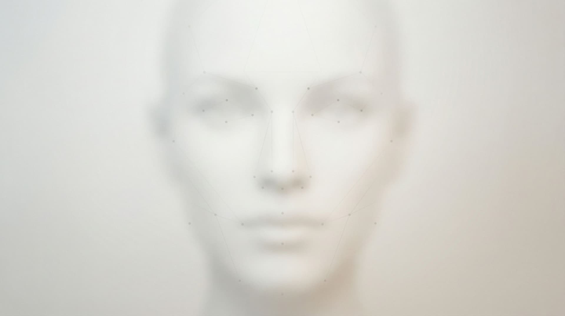 AI generated: Light neutral background with very subtle facial recognition elements.
Soft abstract lines and dots ...