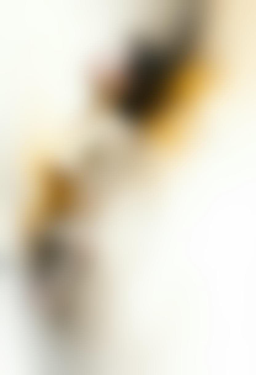 AI generated: Radiant Figure in a Textured Setting: A captivating woman is depicted against a clean, white backgro...