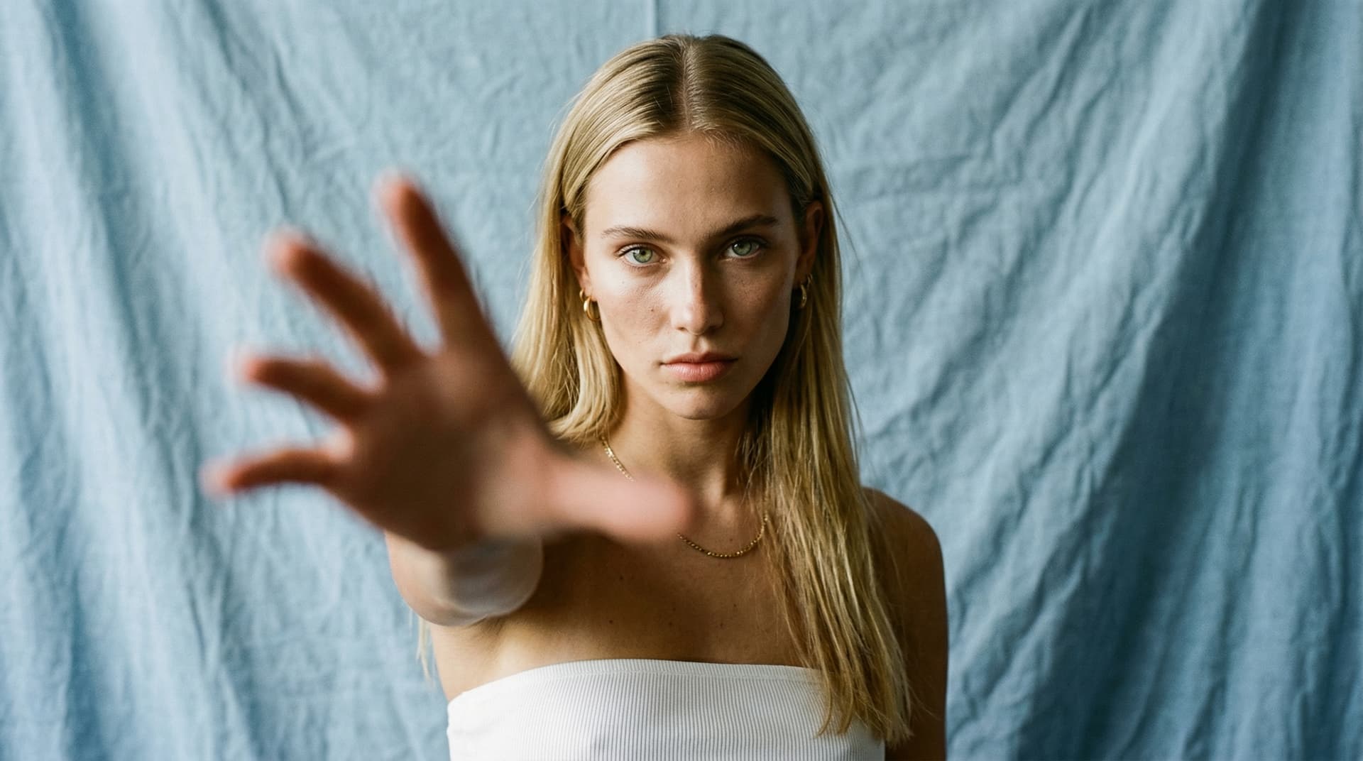 AI generated: (Nano Banana 2)High-end fashion editorial portrait of a young woman with long straight blonde hair a...