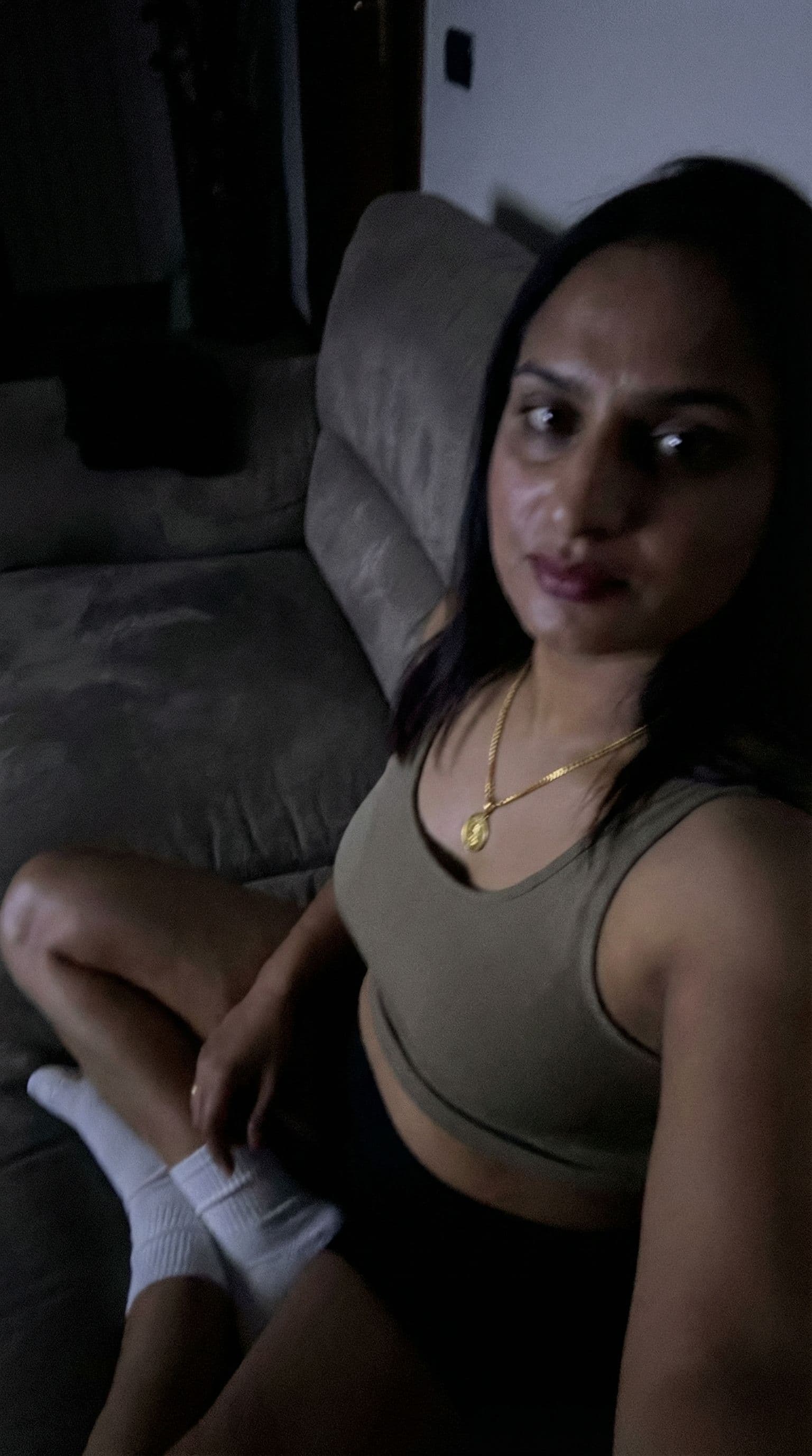 AI generated: Using the uploaded reference photo, create a standard iPhone selfie. There's no clear subject or fra...