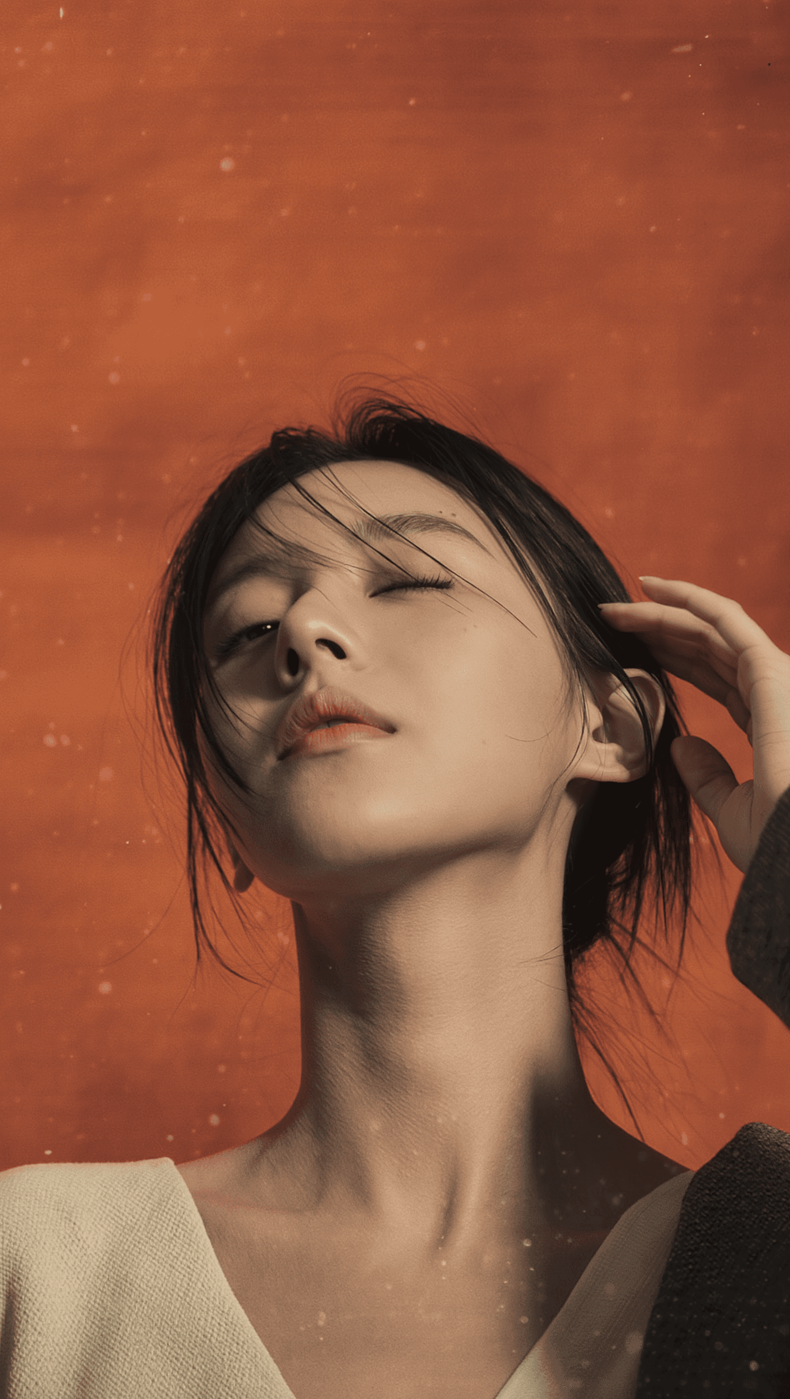 AI generated: Cinematic vertical video (9:16), single Korean female model posing in a studio. Solid orange backdro...