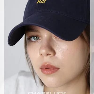 AI generated video: Create a high-fidelity photo [the woman in the uploaded image into mid-20 white woman — use the refe...