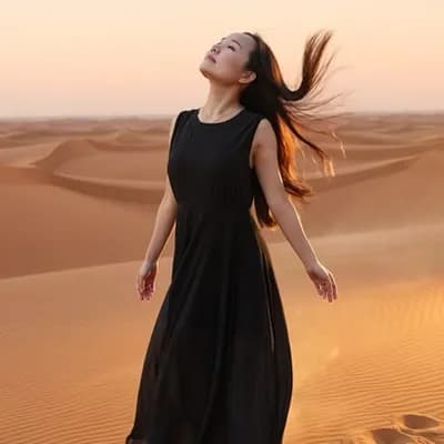 AI generated video: Create video using the uploaded photo:** A stunning Chinese woman in her mid-30 standing alone on a ...
