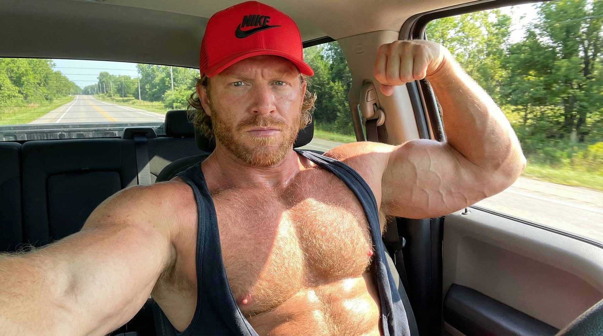 AI generated: Ultra-muscular 30-35yo hairy-chested bodybuilder taking powerful selfie inside truck/SUV, right arm ...