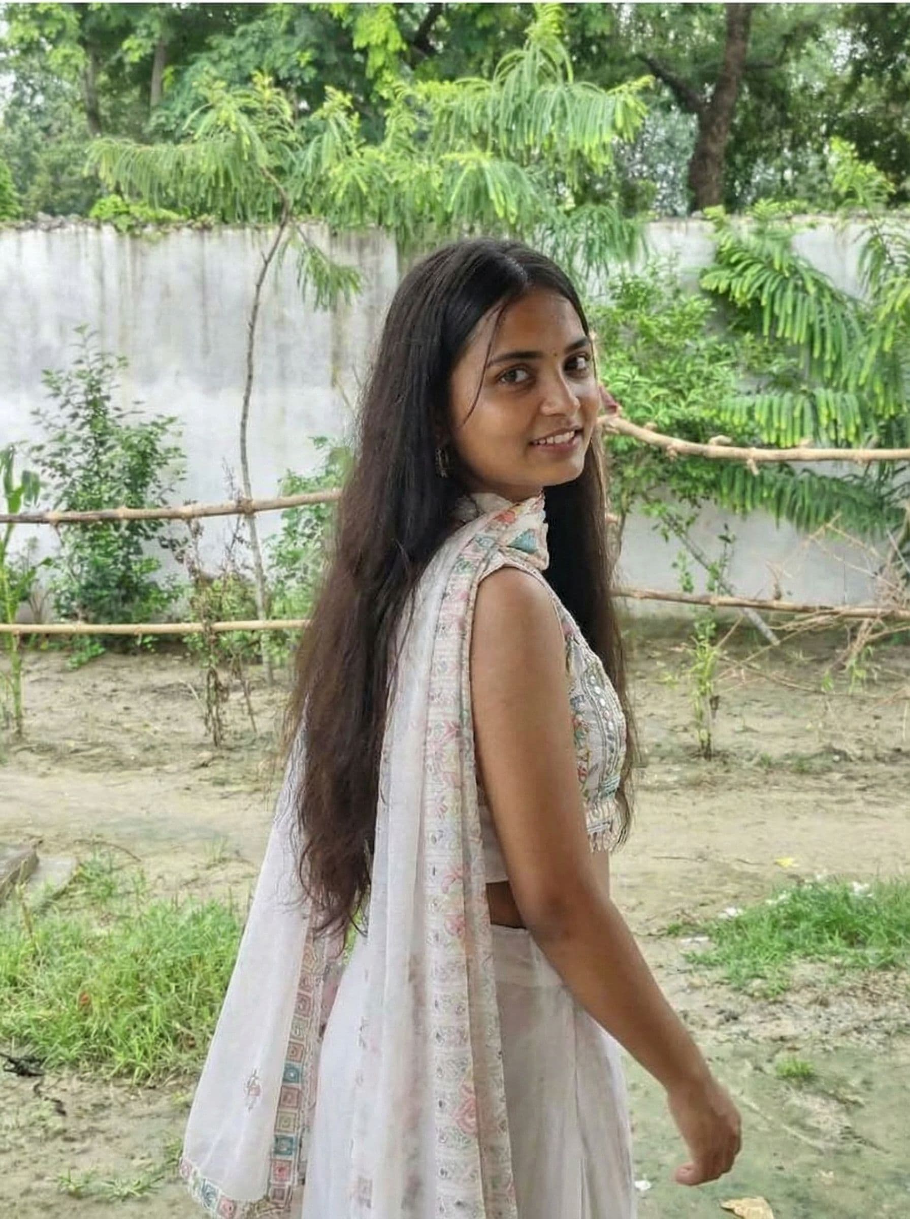 AI generated: 
Have her walking away looking back smiling