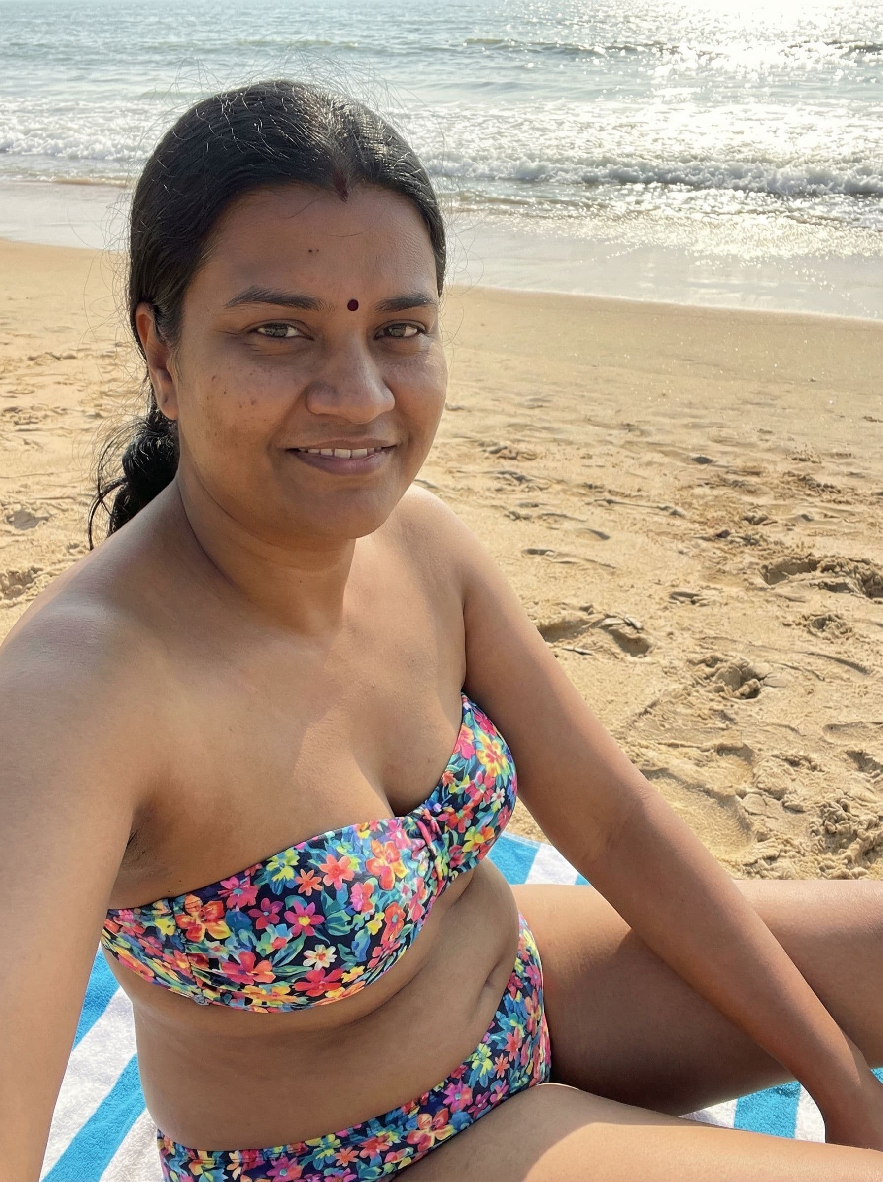 AI generated: The women wearing a strapless floral print bikini ...