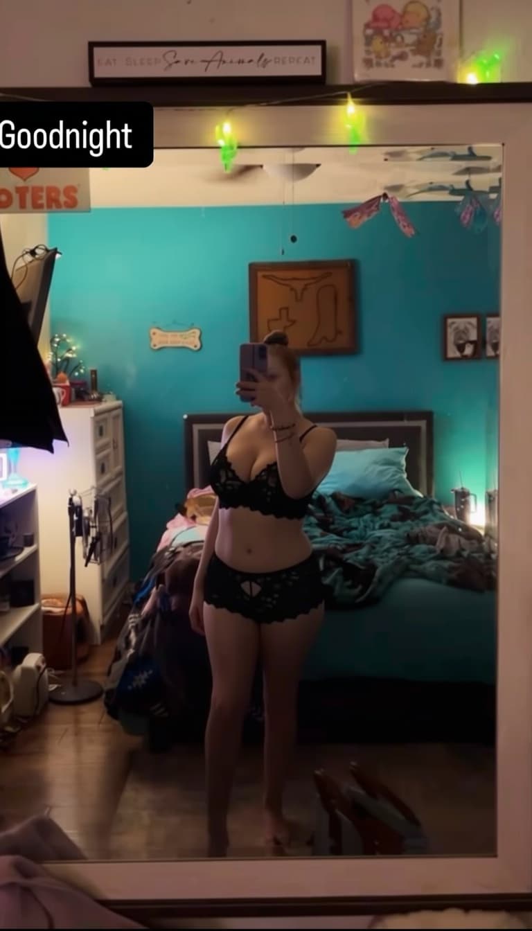 AI generated: Can you give here a black lace Victoria secret lingerie set and remove her bra and leave her with no...