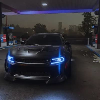 AI generated video: make the car turn on with blue RGB headlights
make the rear wheels do a burn out in place,
after bur...