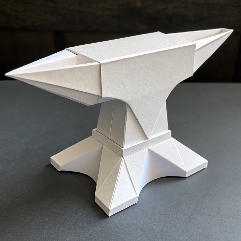 AI generated: minimalist origami anvil, construction, white paper is the style, working as a logotype
two third/o...