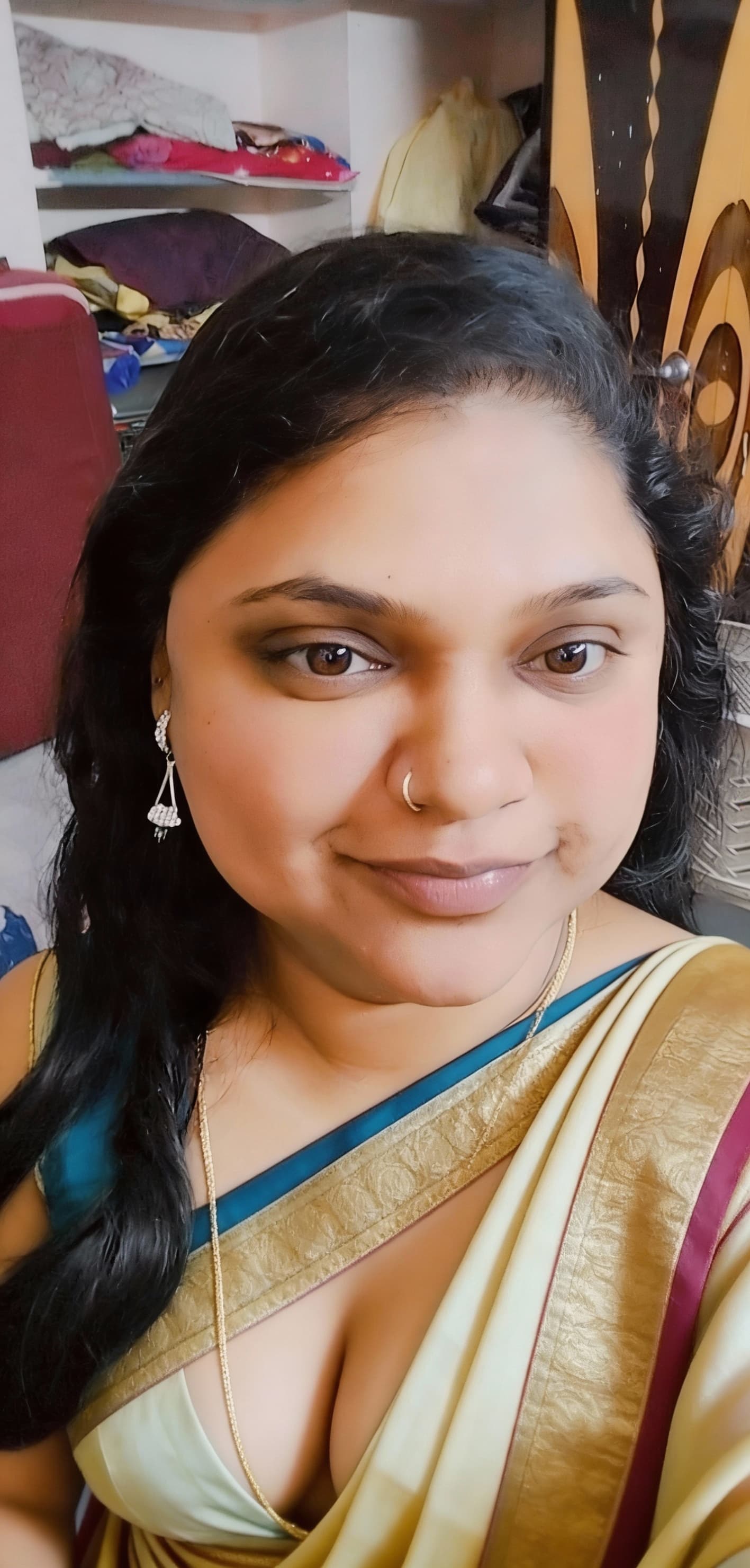 AI generated: can you create photo in saree with deep cleavage