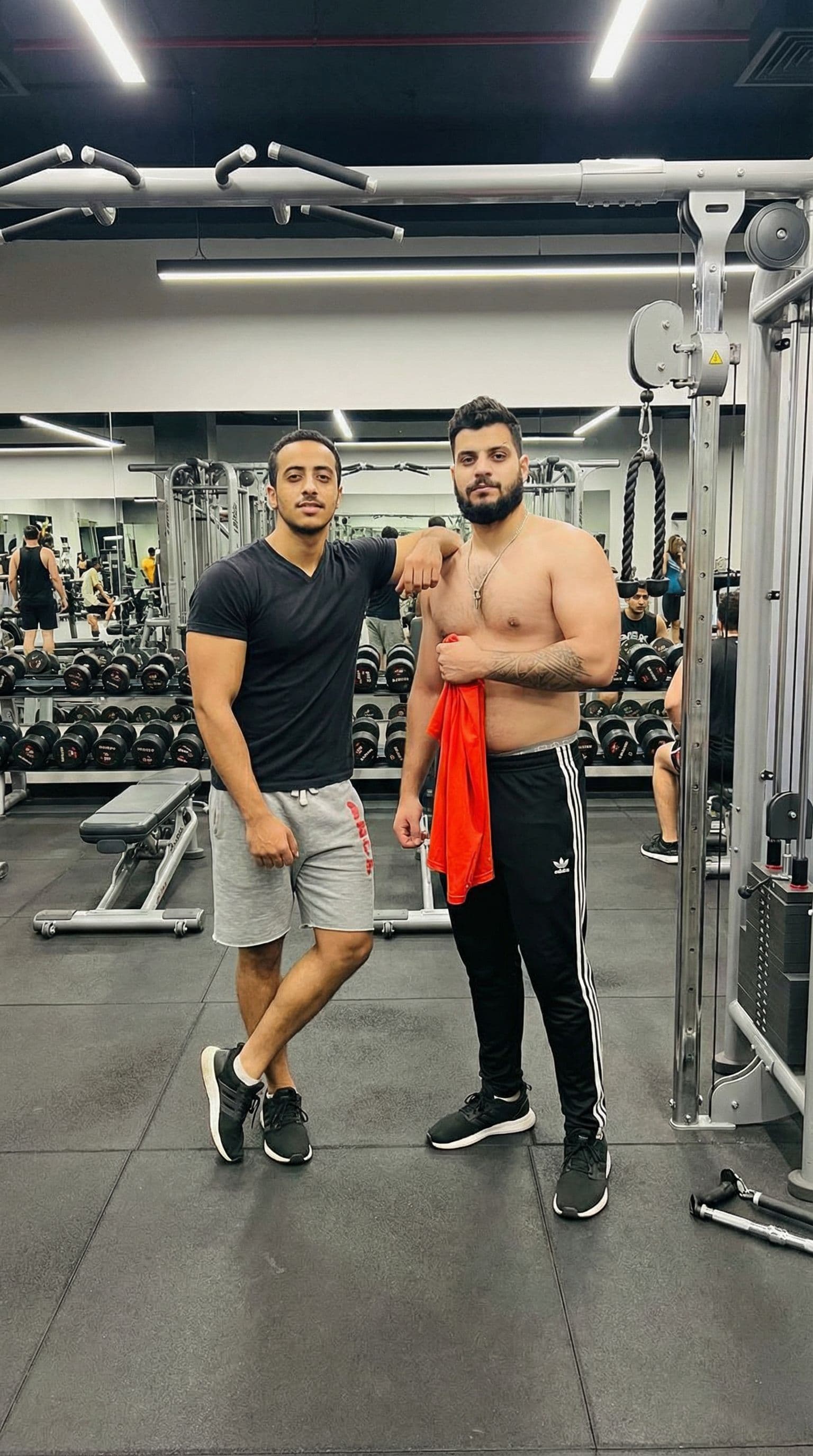 AI generated: Please merge two photos in one picture at Gym