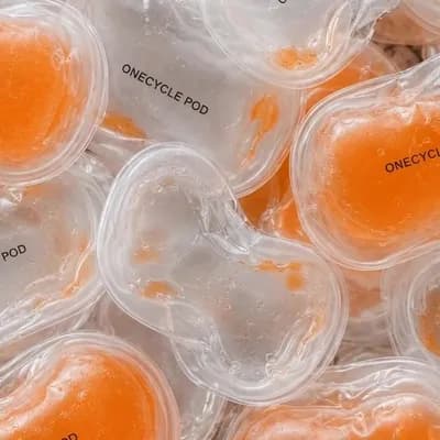 AI generated video: Create a refined animated product shot from the reference image of multiple transparent ONECYCLE POD...