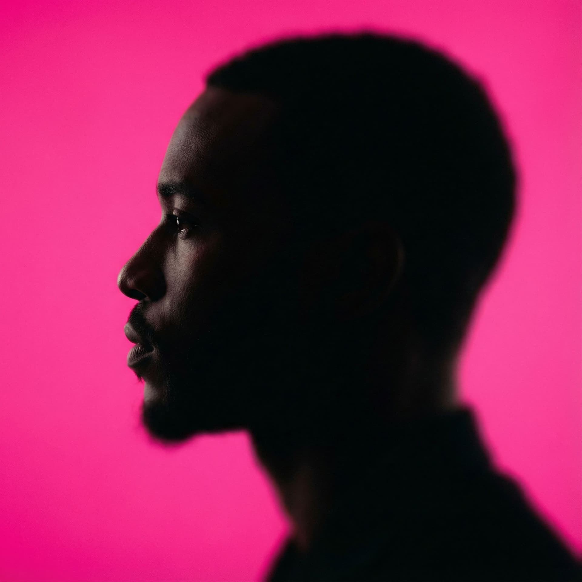 AI generated: photography, portrait of contrast, profile silhouette of a man, vibrant hot pink backdrop, visualize...