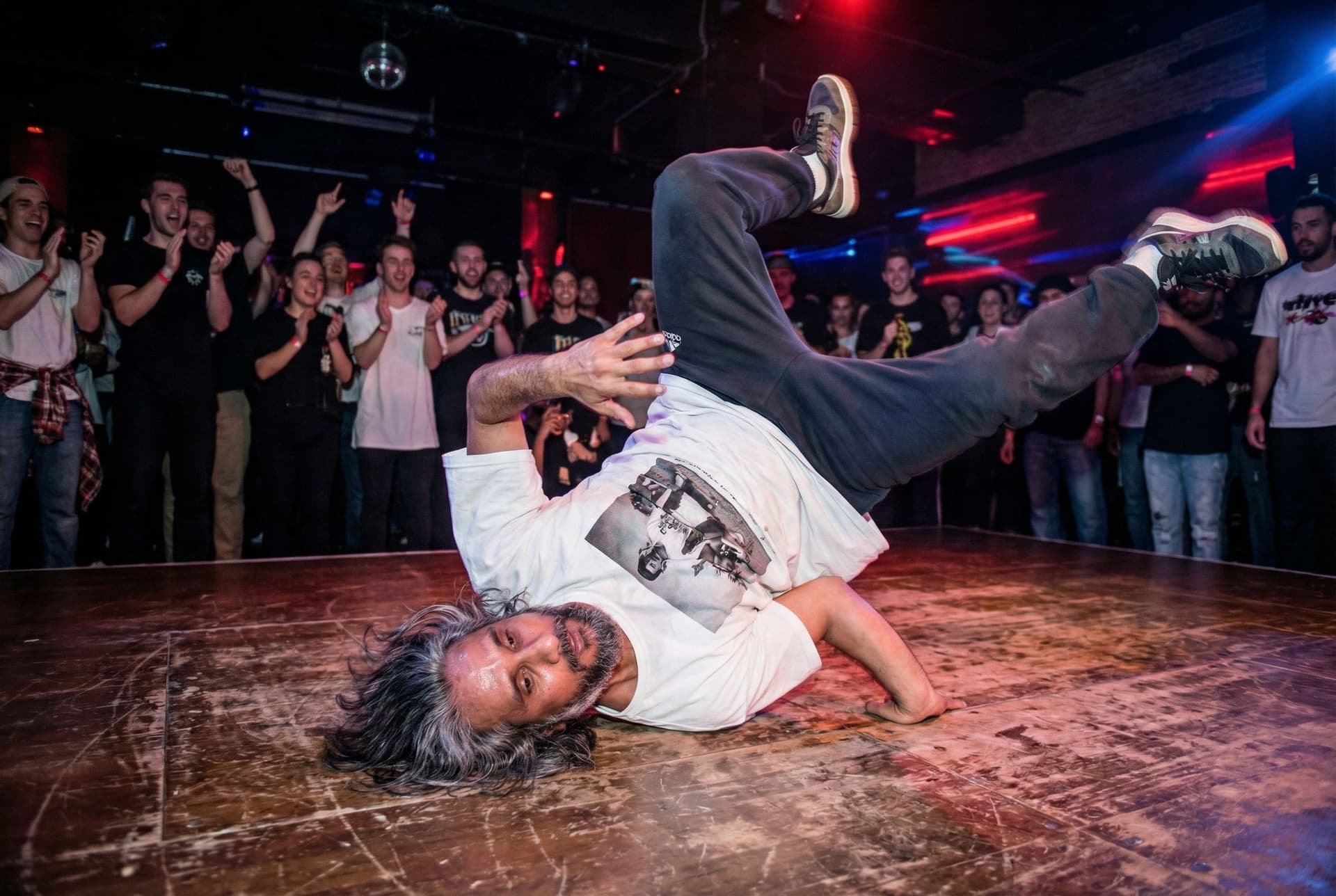 AI generated: make the man do the crazies breakdance the world has ever seen