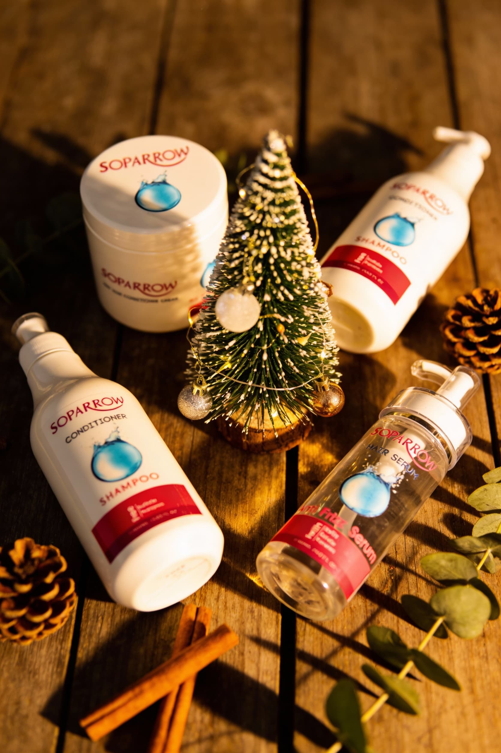 AI generated: Subject: A festive holiday-themed product display featuring skincare and haircare products.
Descript...