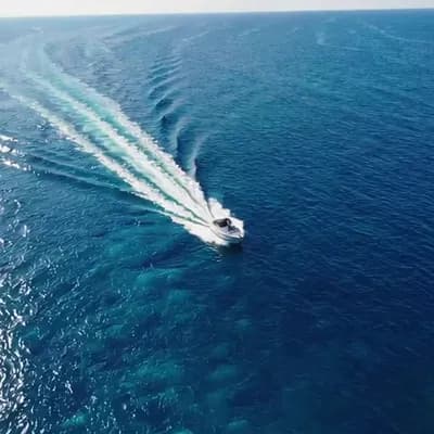 AI generated video: birdseye view of a boat in the croatian ocean
