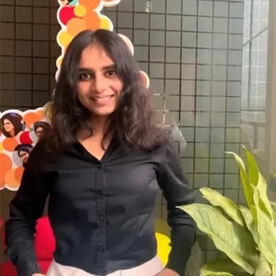 AI generated video: the girl looks at the map then puts it in her pocket and walks towards the camera
