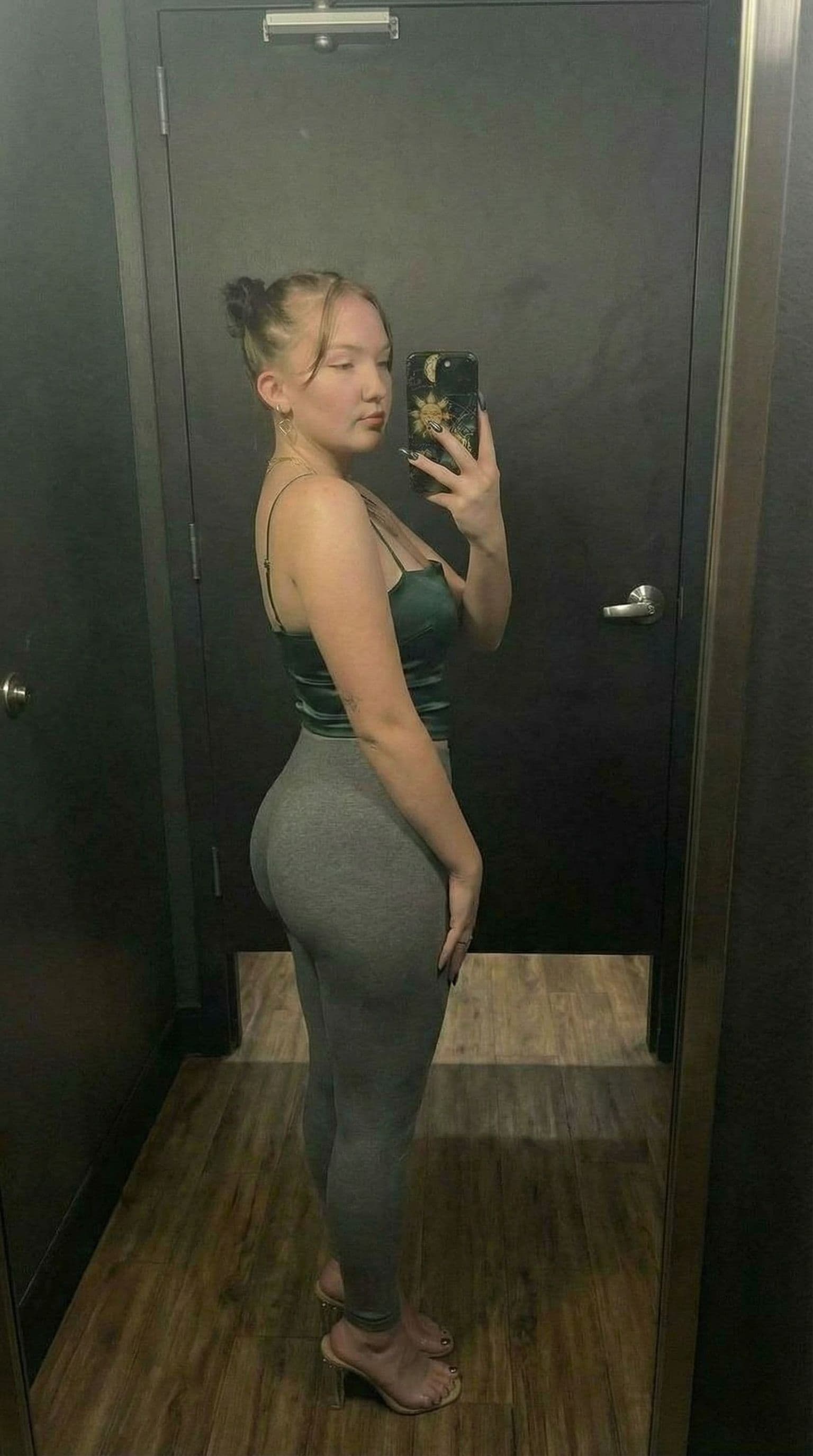 AI generated: give her a bubble butt, keep face unaltered, do not alter her face