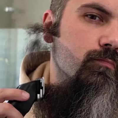 AI generated video: this man shaving his beard