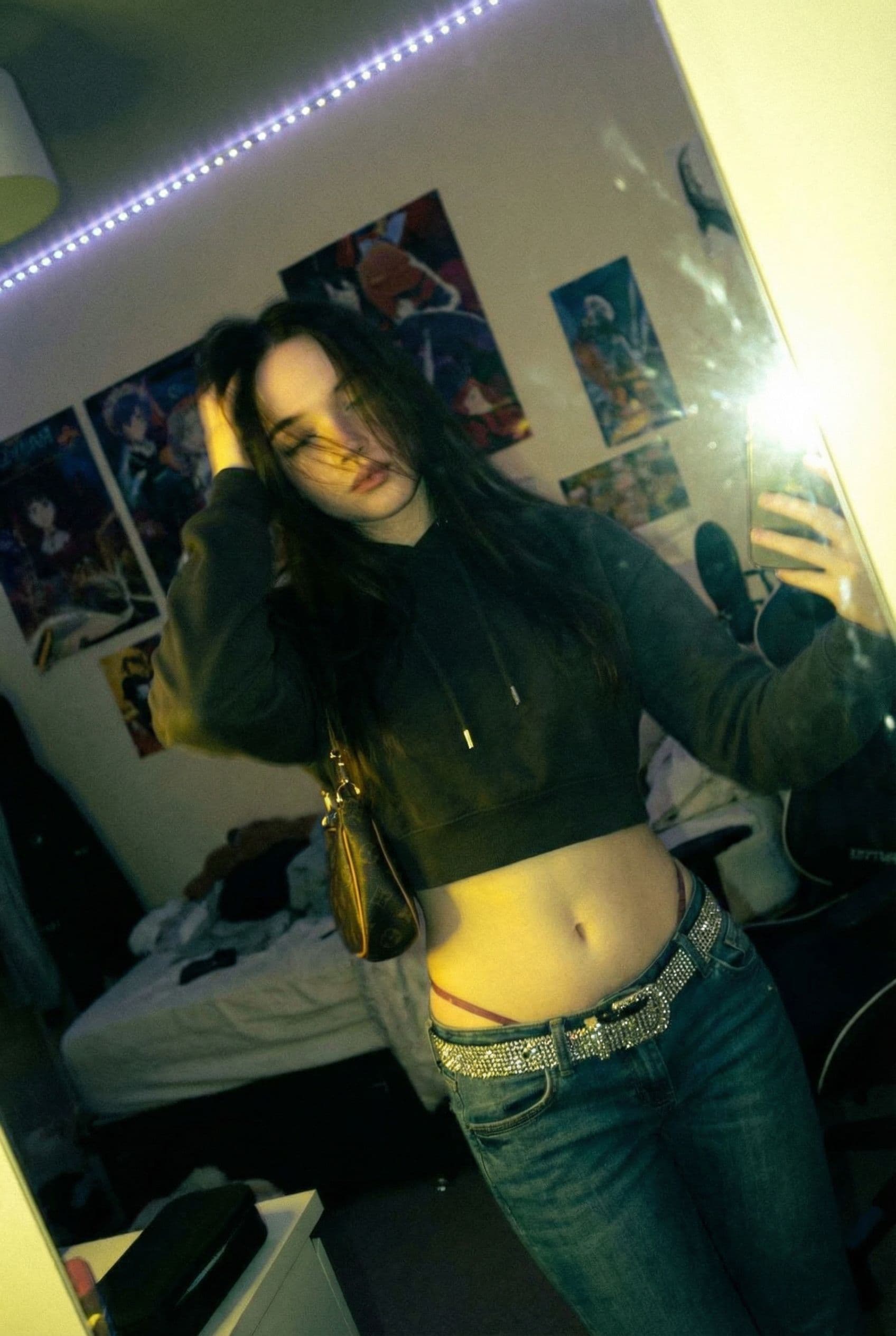 AI generated: a lo-fi 2010s-era, diagonally taken, low-quality iPhone photo of a 20-year-old baddie. The shot is i...