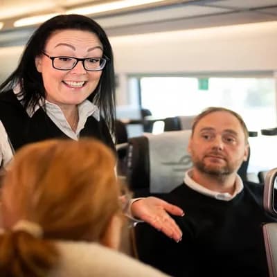 AI generated video: Let the woman smile and start talking