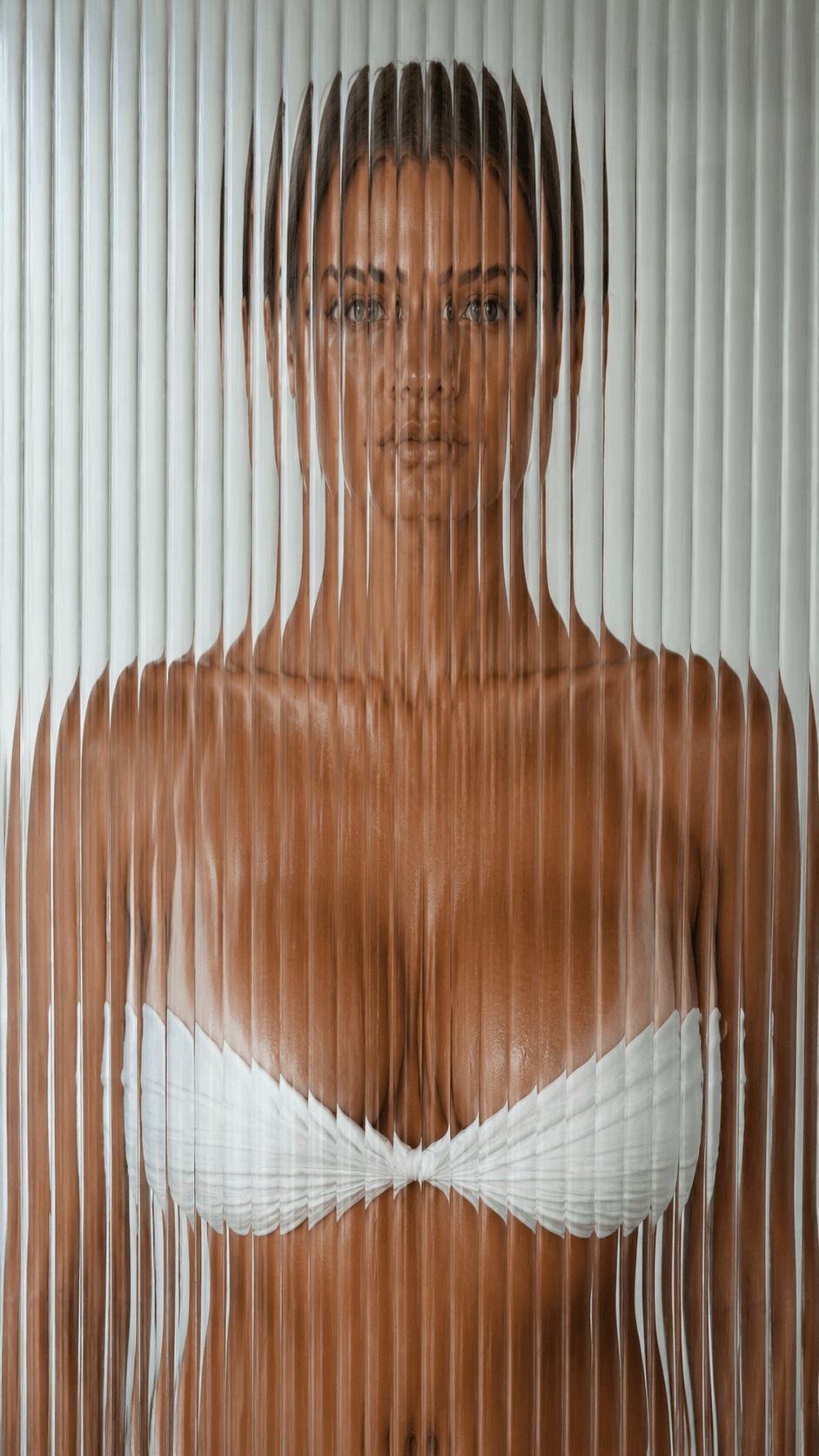 AI generated: reveals pronounced bikini tan lines and a noticeably enhanced, very round upper-body silhouette, wit...