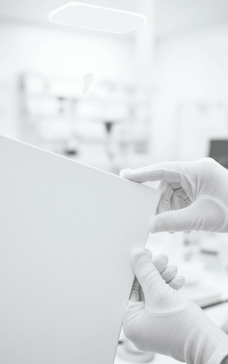 AI generated: close up of two hands whith white gloves holding the corner of a big  blank paint canvas, blurred ba...