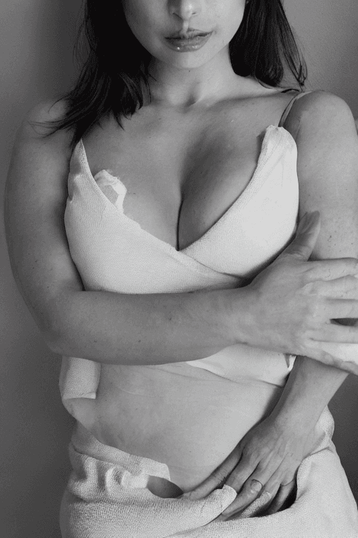 AI generated: A woman, her nipples erect, her thighs slightly parted. (loud moaning:1.4), (white top:1.4), (off-th...