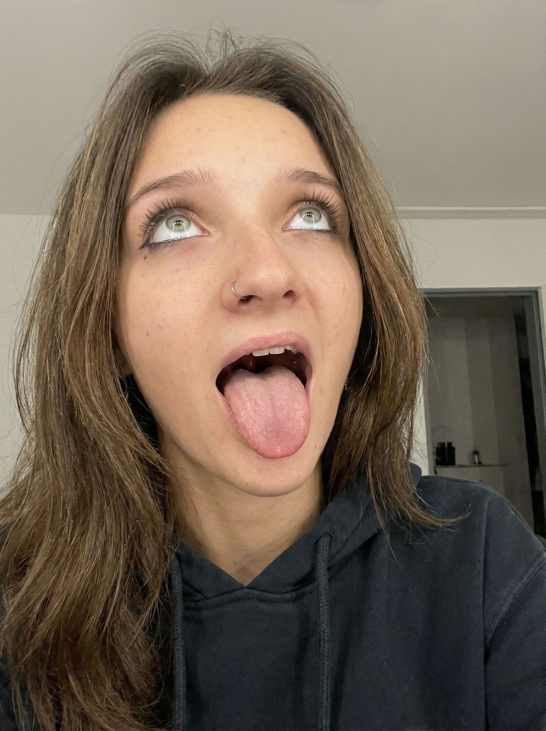 AI generated: Make her do the aheago face with the mouth wide open
