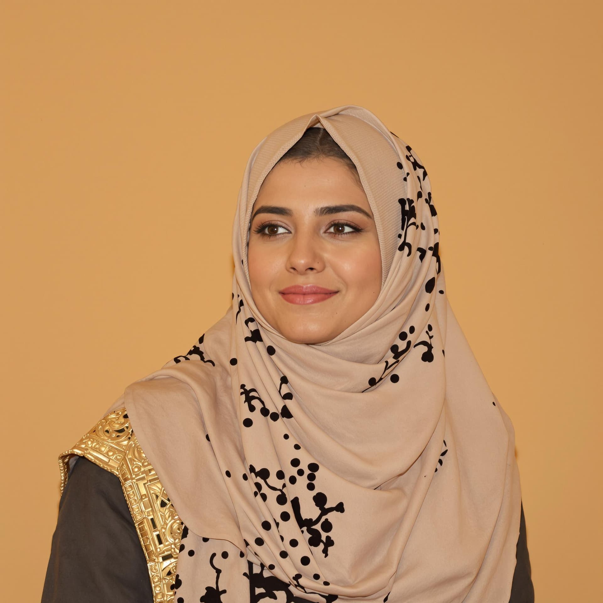 AI generated:  Arab woman 30 posing against a warm beige backdrop.