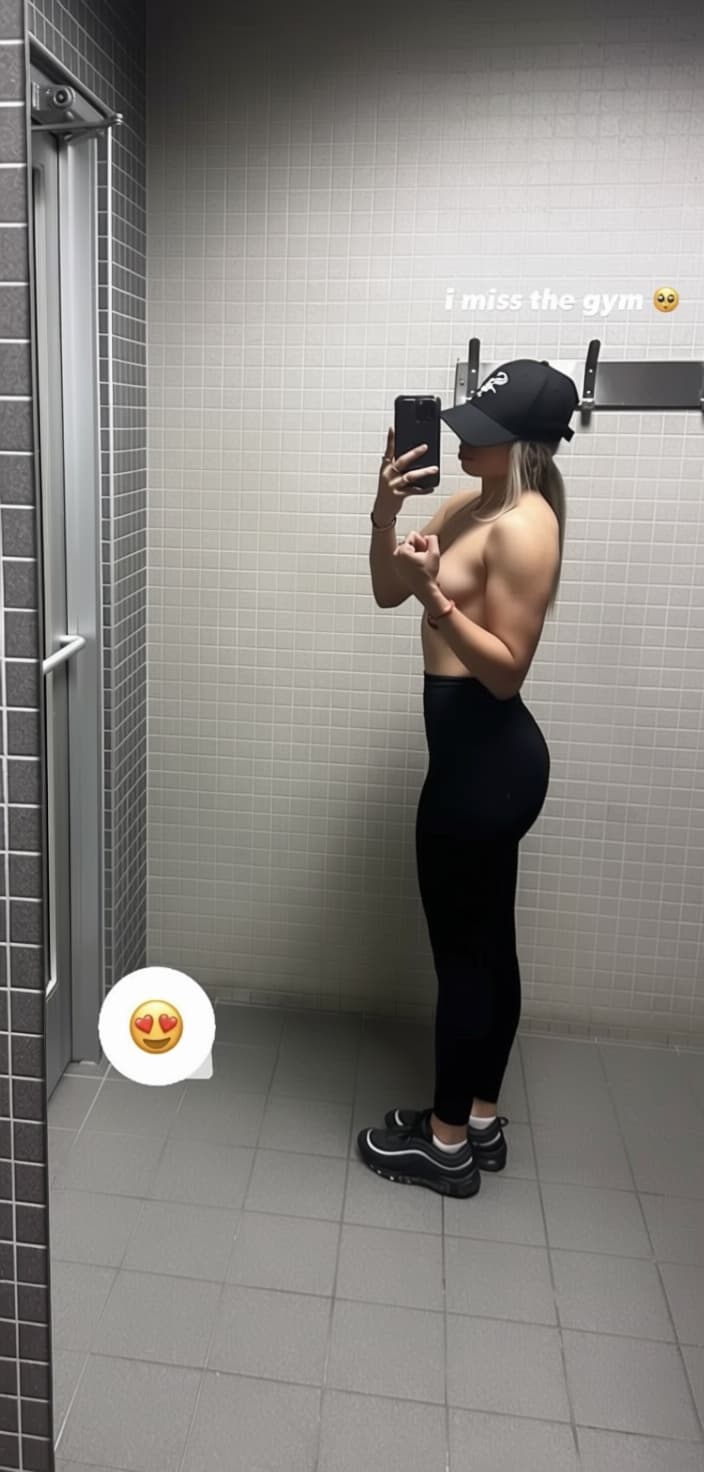 AI generated: Can you remove her bra and leave her with no top