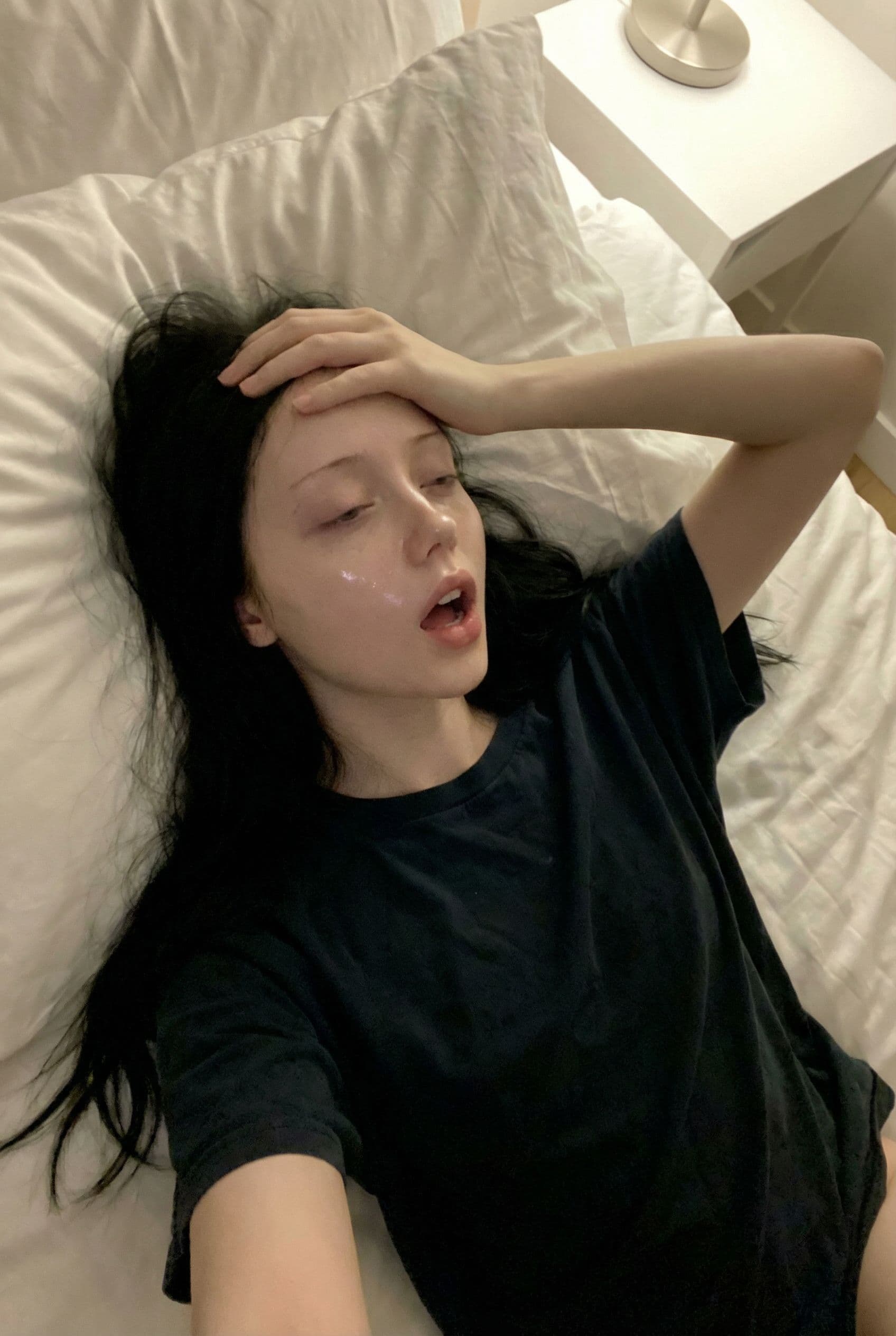 AI generated: photo realistic:2.0 masterpiece highest quality photograph realistic girl on bed mouth_open_moaning ...