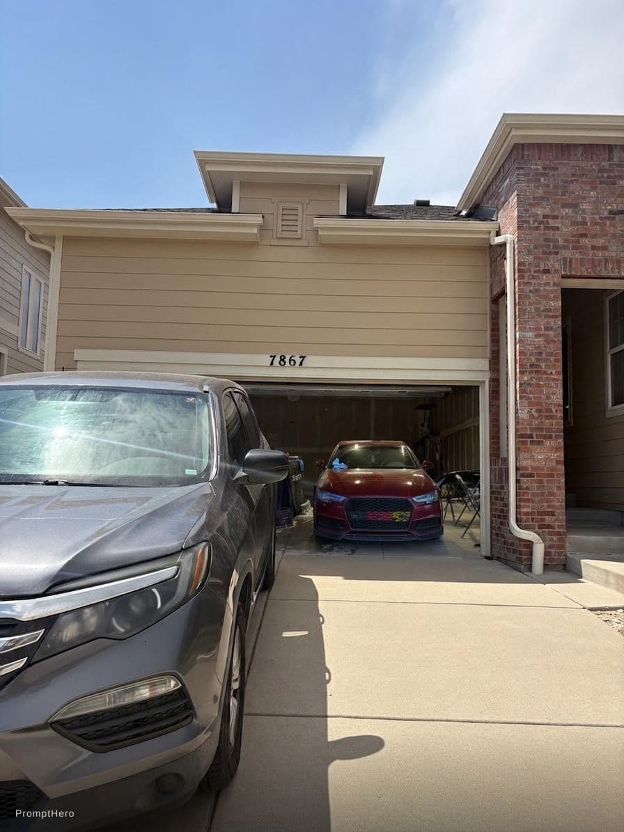 AI generated: put my audi in the second picture parked inside the garage of the first picture. please make everyth...