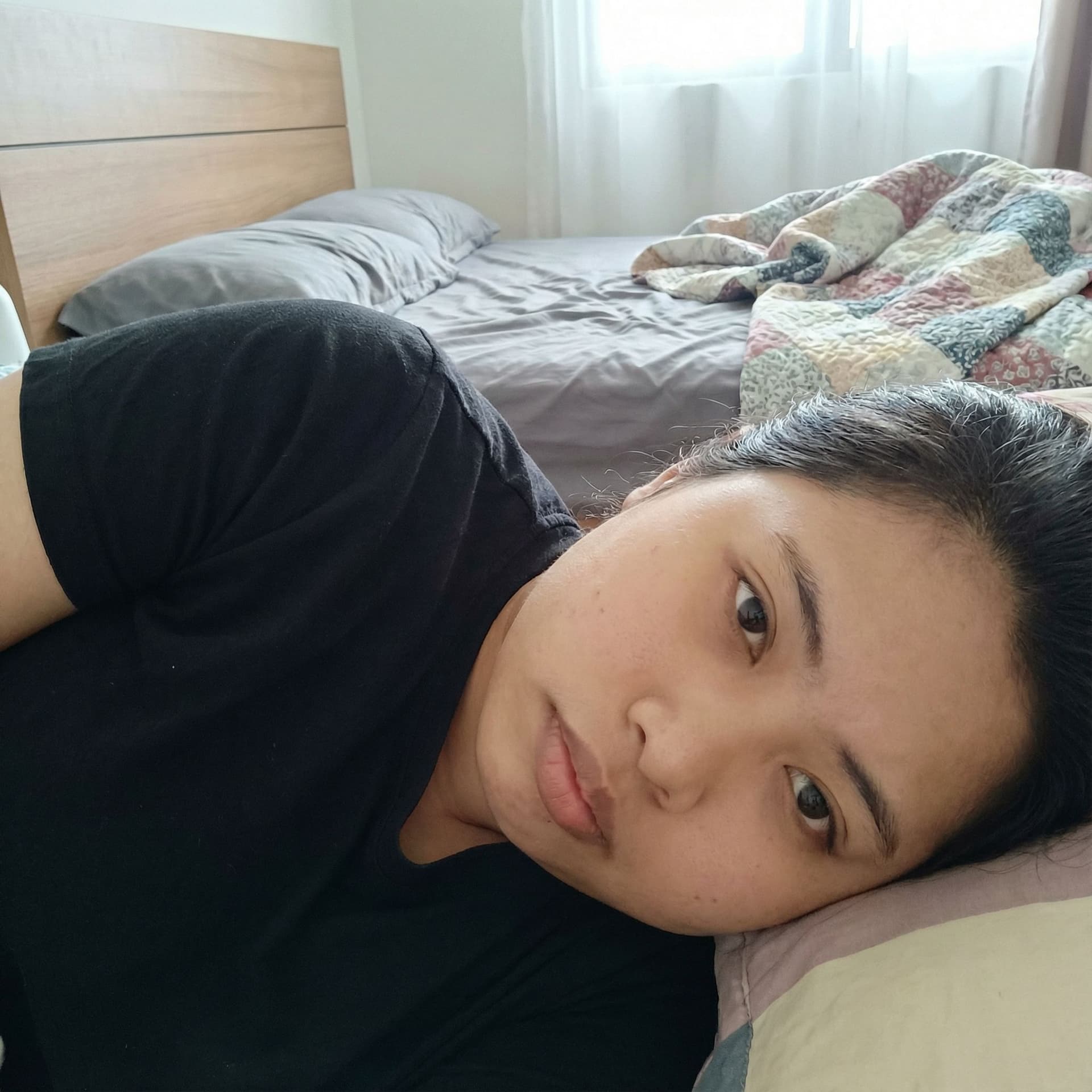 AI generated: make these nude and lying on the bedroom
