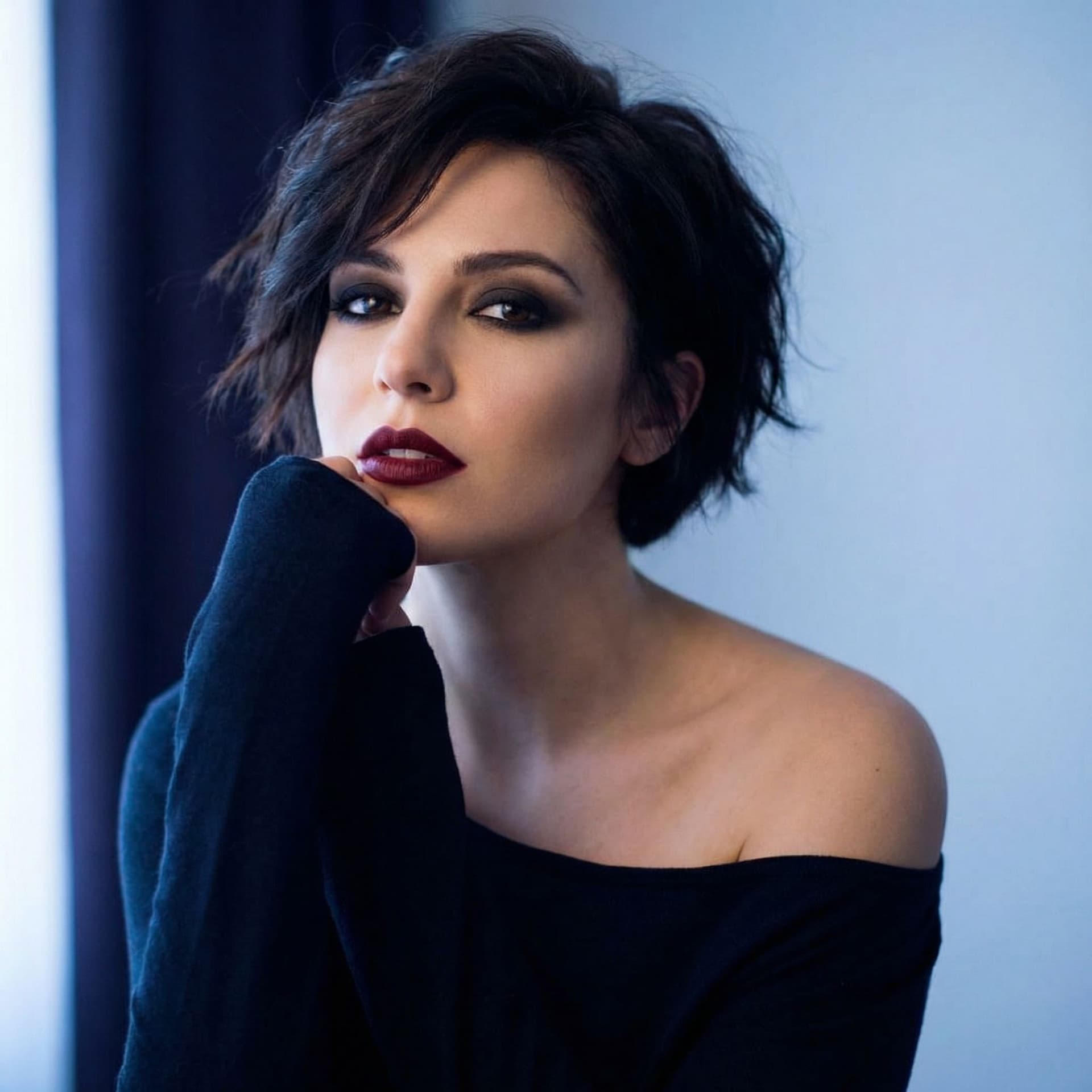 AI generated: Create a highly detailed, photorealistic portrait of a woman with short black hair and dramatic make...