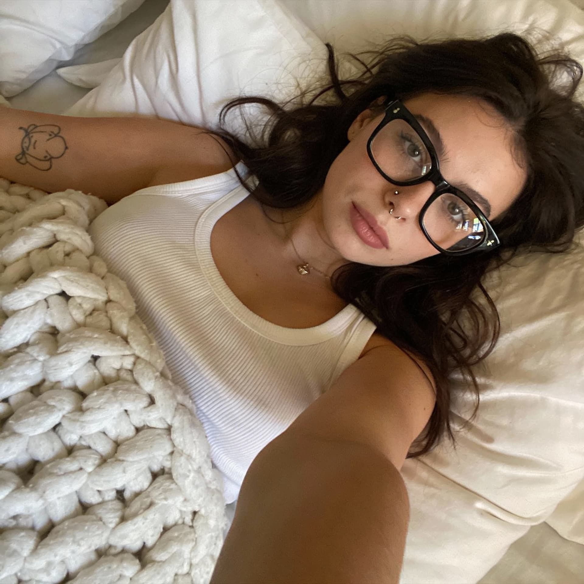 AI generated:  "subject": {
    "gender": "Female",
    "age_appearance": "Young adult",
    "hair": "Long, dark b...