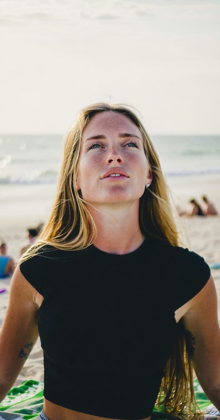 AI generated: "{ "subject": { "description": "A woman from the reference image, long blonde hair, fair skin, slend...
