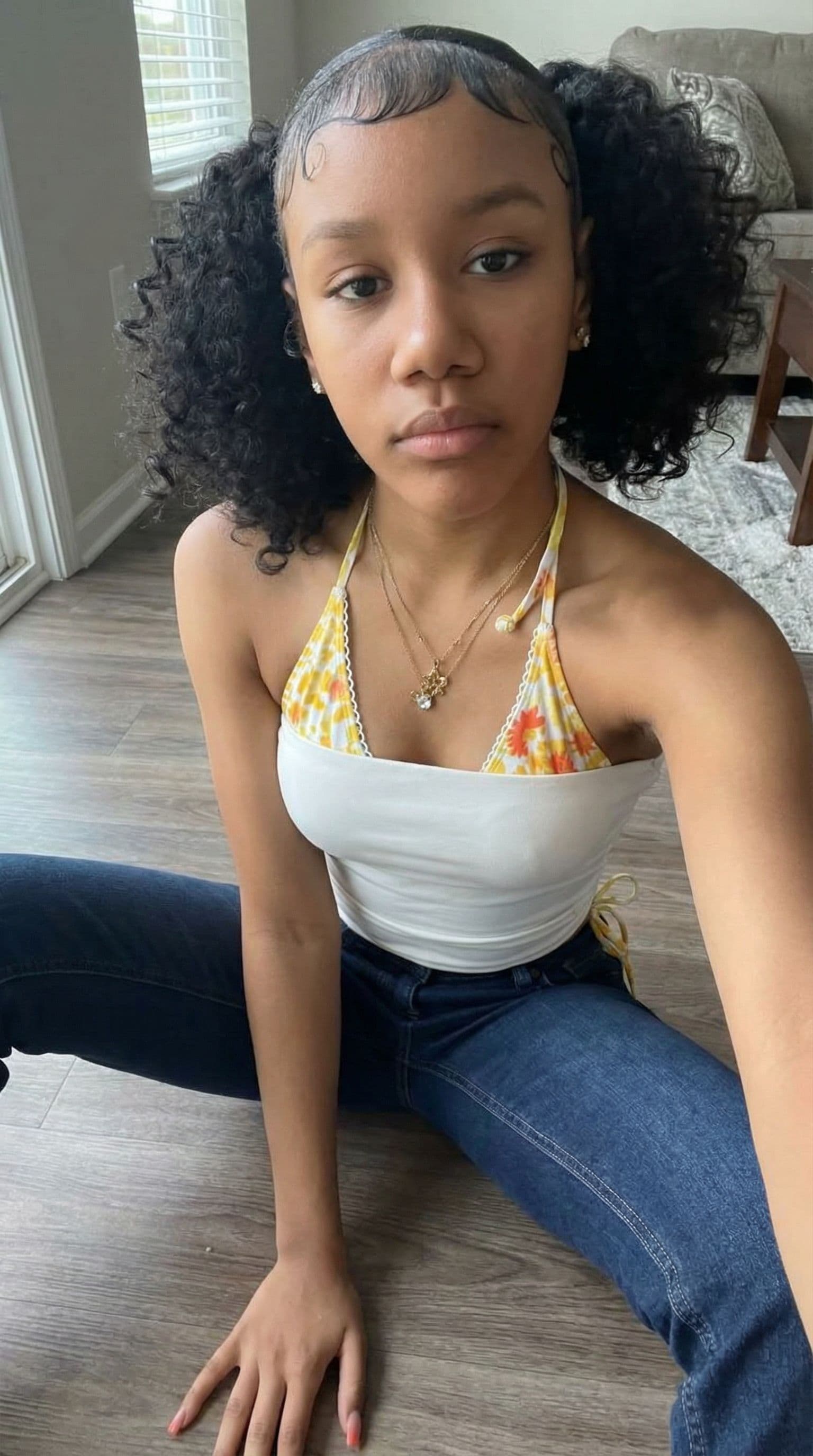 AI generated: Her on the floor with her legs being spread out with her pussy showing and her hands near it 