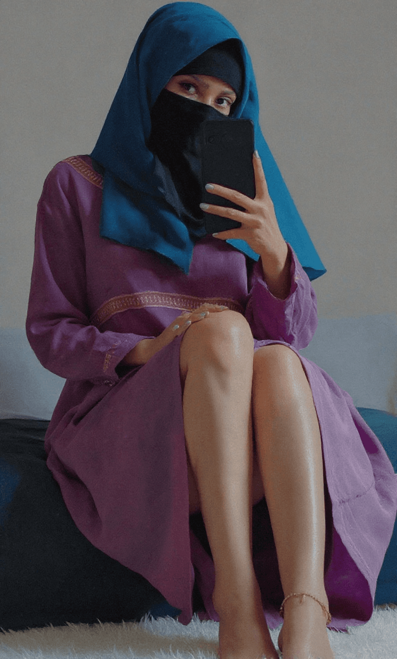 AI generated: Hijabi girl showing boobs in abaya
