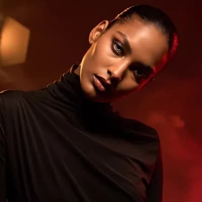 AI generated video: front shot, upper body, professional model, greek dark face features, different colored eyes blue an...