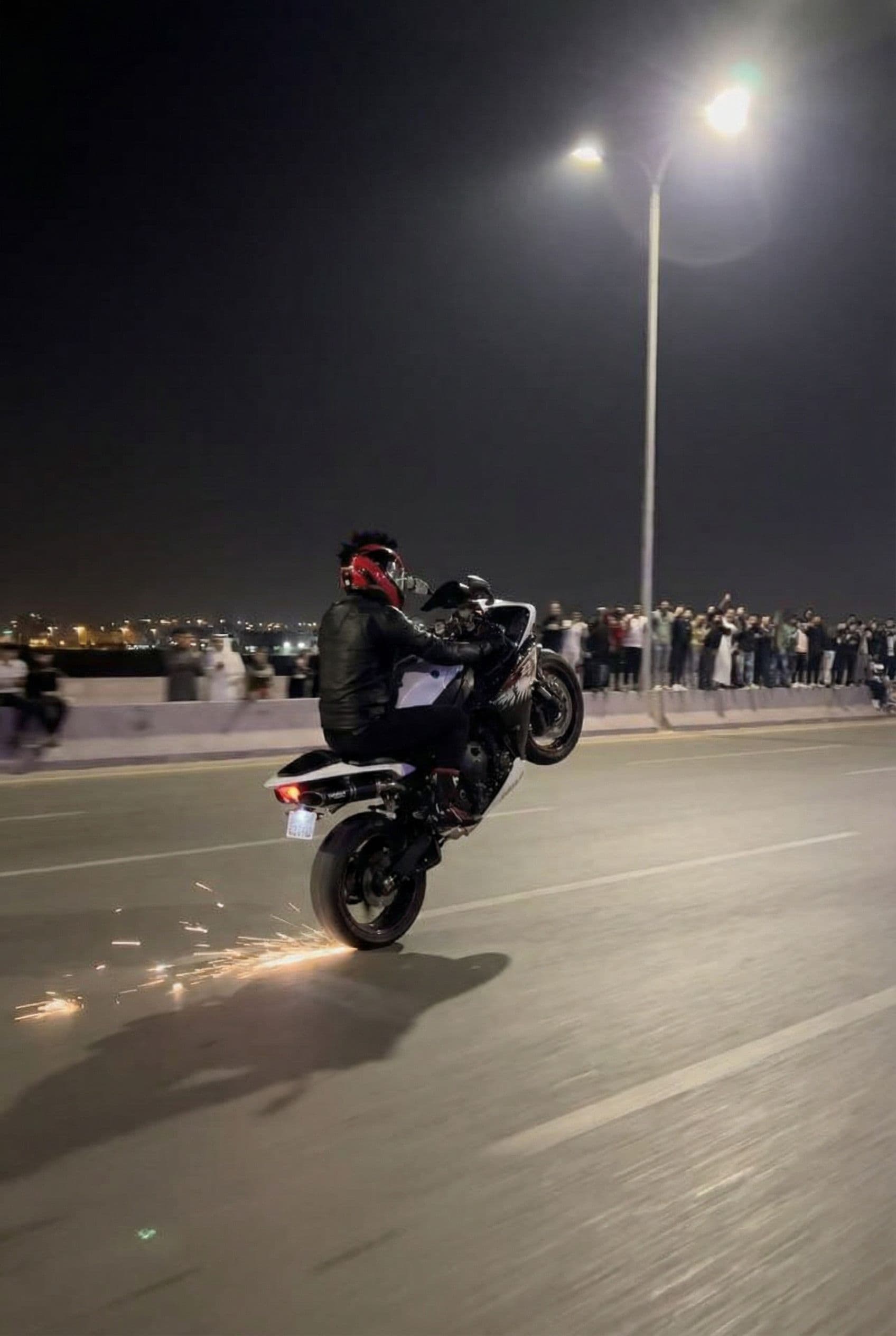 AI generated: Wheelie on the uploaded high way