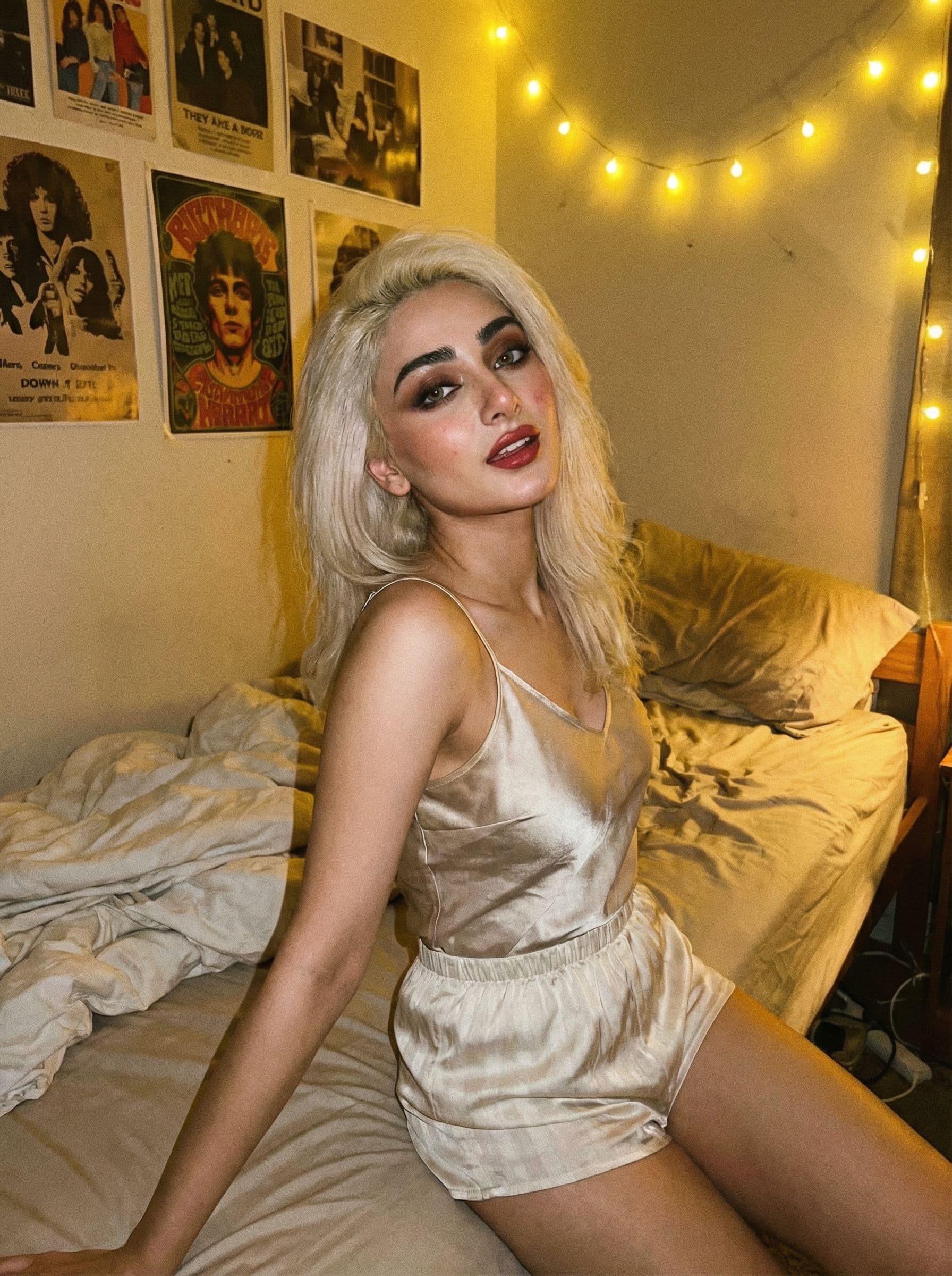 AI generated: A bold retro photograph of a curvy young female with platinum blonde hair and dramatic makeup. She w...