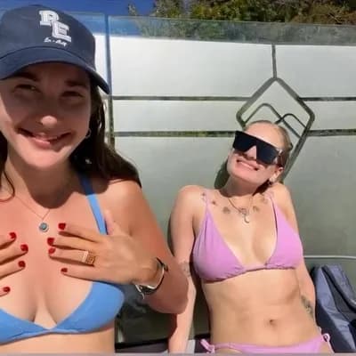 AI generated video: Enjoying pleasure holding tits