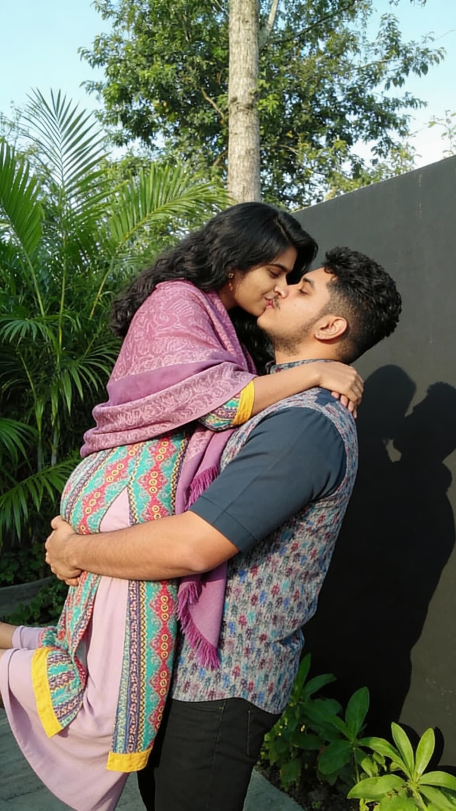 AI generated: The man lifting the women on his arms and kissing the lips