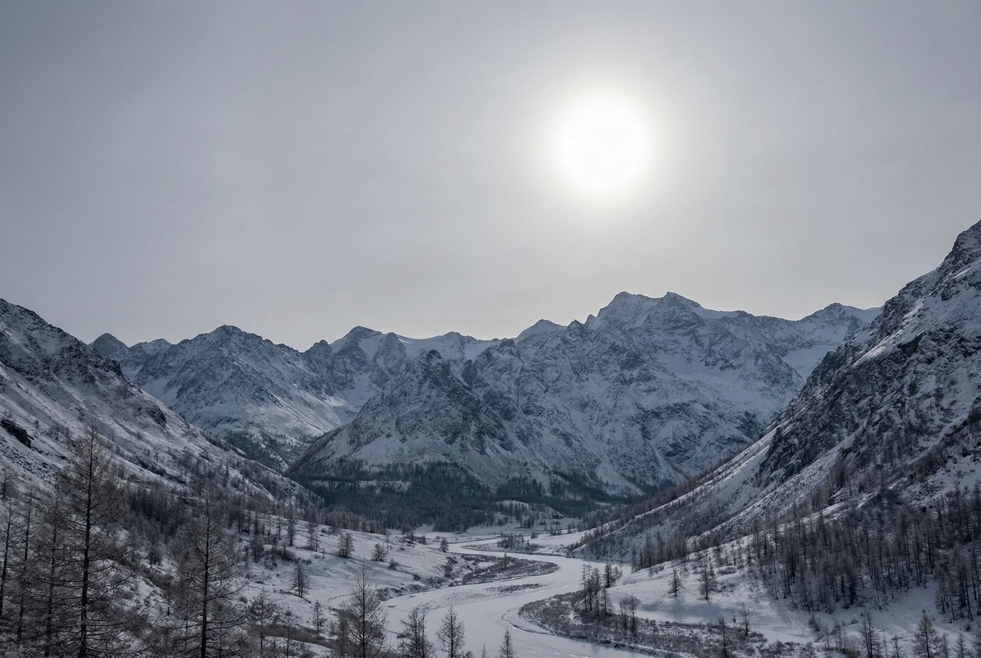 AI generated: a scenic landscape with tall mountains and valleys but the sky has a more grey color  with no clouds...